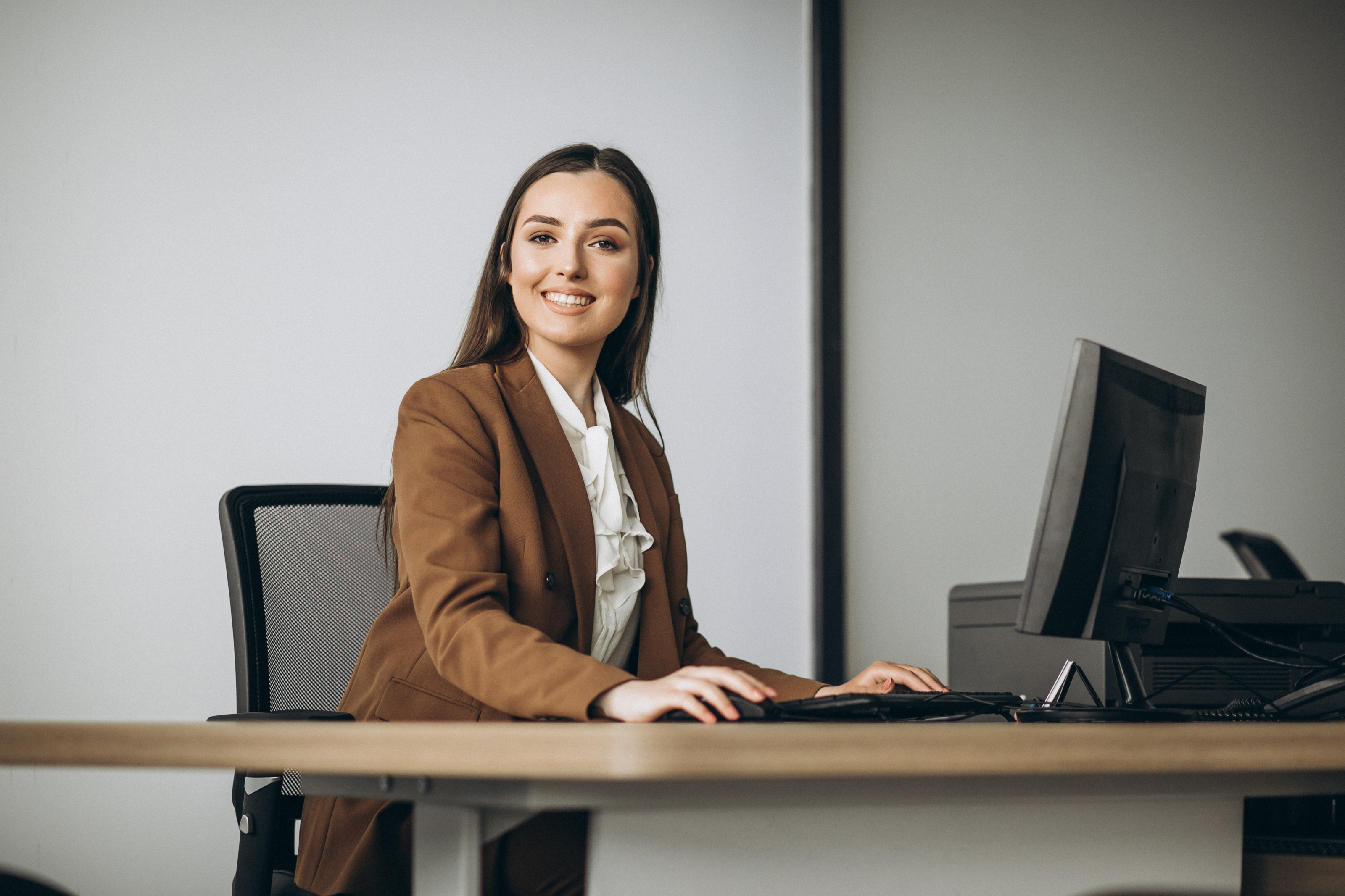 young-business-woman-working-laptop-office.jpg